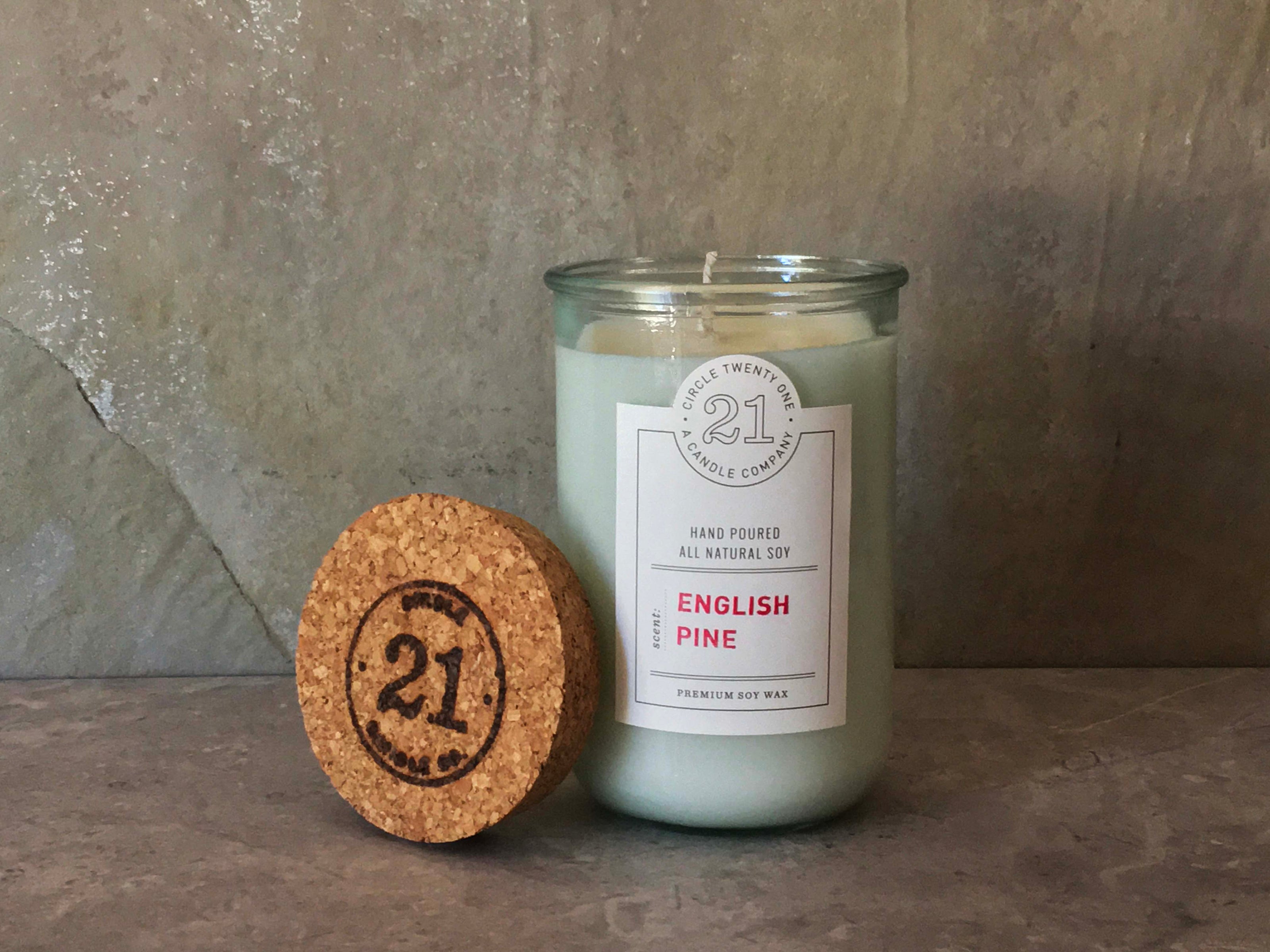 Woodsy aroma of pinon pine.  Hand poured into 100% recycled glass vessel.