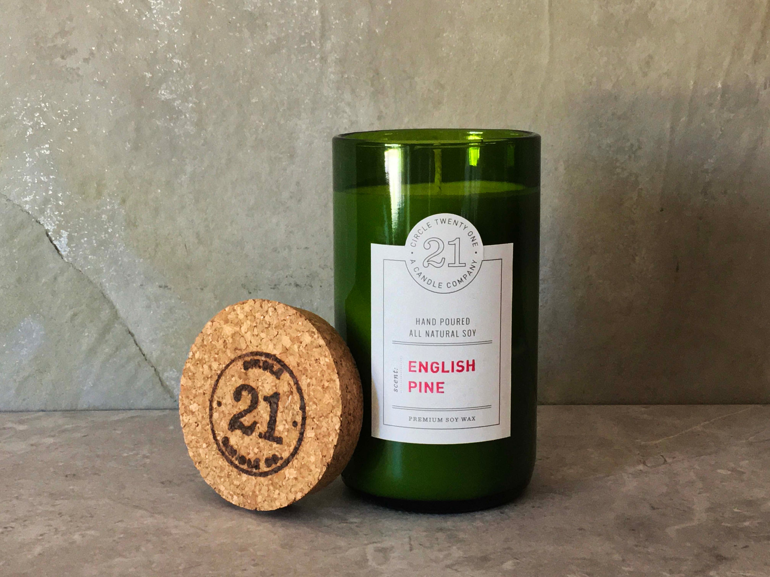 Woodsy aroma of pinon pine.  Hand poured into recycled wine bottle.