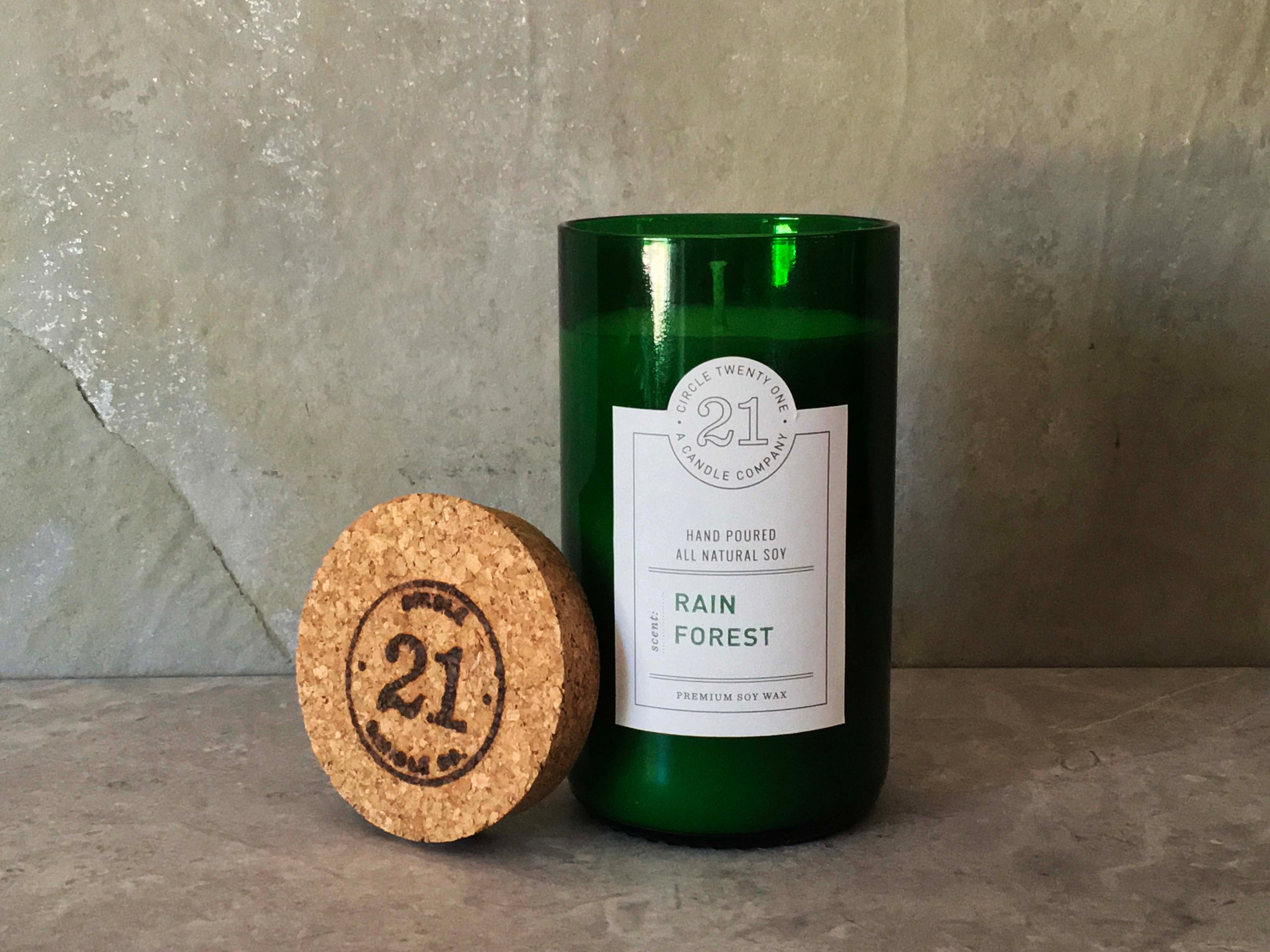 Scented blend of tropical fruits, sugared citrus, jasmine and forest greens.  Hand poured into recycled wine bottle.