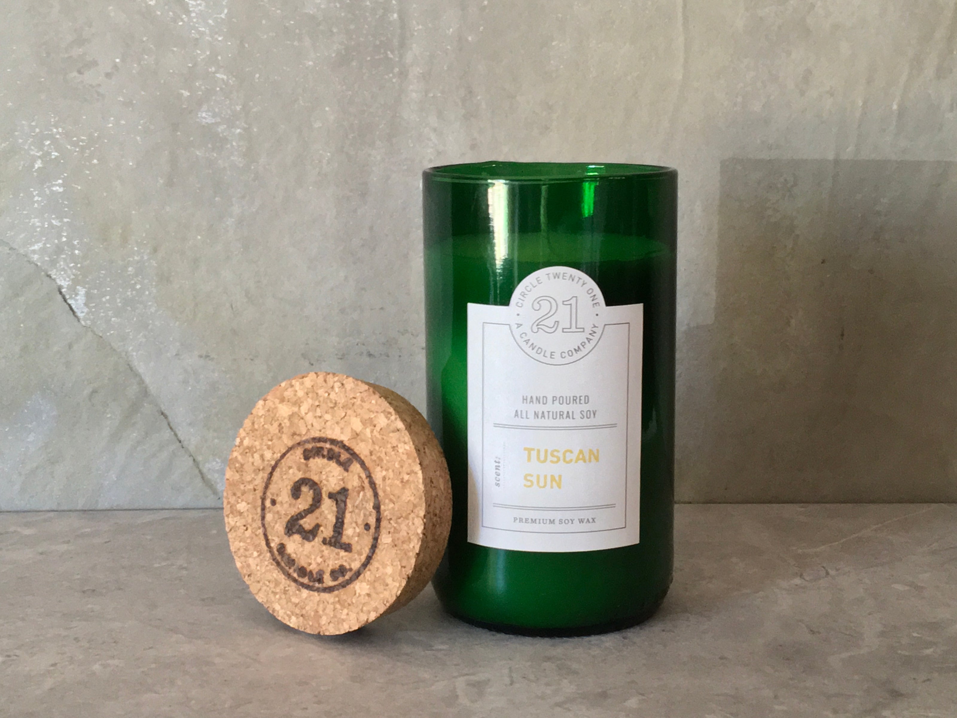 Fresh berries, mandarin, coconut, apricot, mimosa blended with vanilla and musk.  Hand poured into recycled wine bottle.